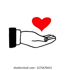 hand and heart drawn in doodle style. love and kindness concept