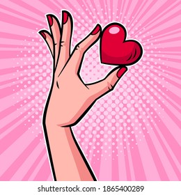 Hand With Heart, Holding Heart With Two Fingers. Pop Art Vector Illustration. Valentine's Day Concept.	
