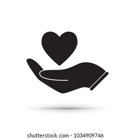 Hand with heart icon isolated on white background. Silhouette of a hand with heart in it. Vector illustration for your graphic design.