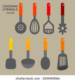 Hand held silicone cooking utensils with colorful handle, on light blue background. 