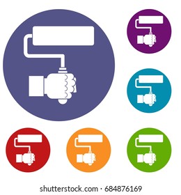 Hand hoding paint roller icons set