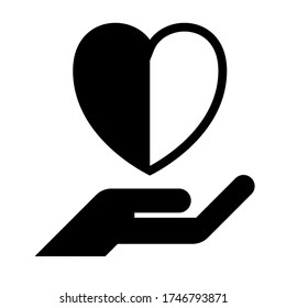 Hand hold black and white heart to show black and white to live together concept design.