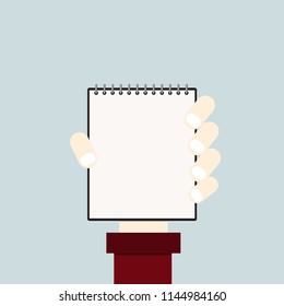 Hand hold blank notebook