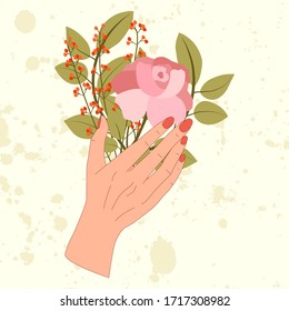 Hand hold bouquet with pink rose, branch with leaves, berrys bunch. Elegant floral composition for greeting card.