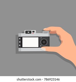 hand hold camera vintage vector