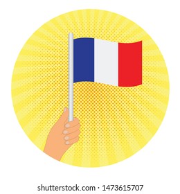 hand hold Flag of France . Hand holding a France flag - vector icon.   RETRO STYLE