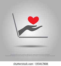 hand hold heart from the laptop vector icon