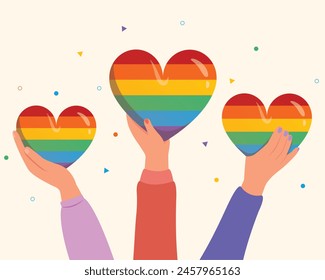 Sostén los corazones LGBT arco iris y celebra el mes del orgullo. Feliz día del orgullo. 