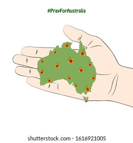 Hand hold a map of Australia in wildfires .