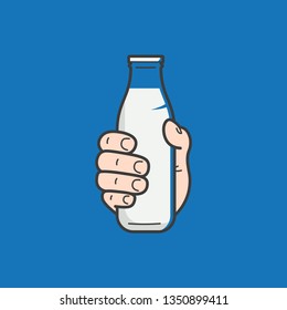 Hand hold milk bottle. Male hand holding a milk on blue background