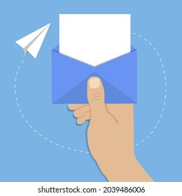 Hand hold open blue postal envelope, around flying paper plane. Email concept, one new message. Vector illustration