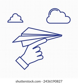 A hand hold paper airplane starting for fly with cloud on book grid background, freedom airplane toy or transportation direction business growth idea concept