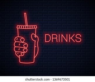 Hand hold paper cup neon sign. Male hand holding a red paper cup with straw on wall background