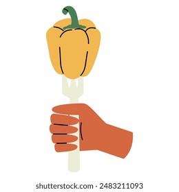 Hand hold a pepper on a fork.