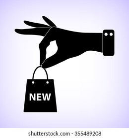 hand hold shopping bag -  black vector icon