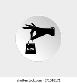hand hold shopping bag -  black vector icon