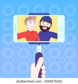 Hand Hold Smart Phone With Stick For Selfie Photo Of Two Hipster Men