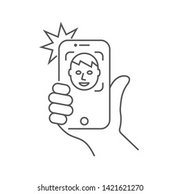 The hand hold the smartphone and doing selfie. Photo on smartphone. Editable Stroke. EPS 10.