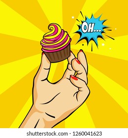 Hand hold sweet cupcake in a pop art style. Delicious dessert with cream for vintage birthday party. Vector flat illustration