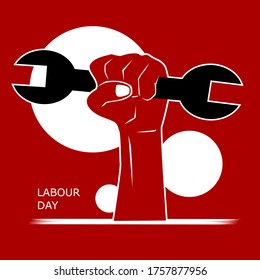 Hand hold a wrench for World Labour.  vector image