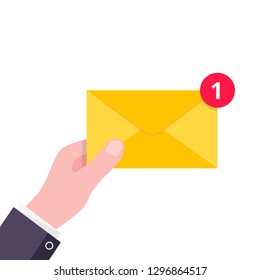 Hand hold yellow envelope letter with number 1 on it. E-mail concept new message or sms flat style design vector illustration isolated on white background. Message or sms delivering and notification.