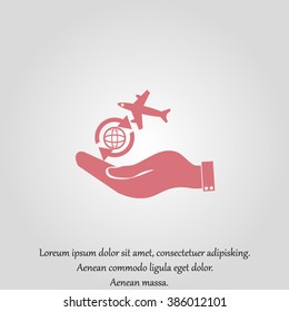 hand holding a airplane symbol.