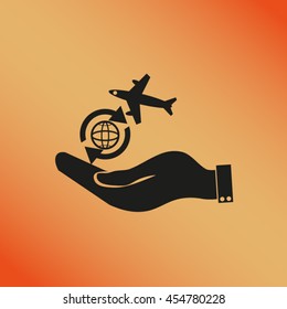 hand holding a airplane symbol.