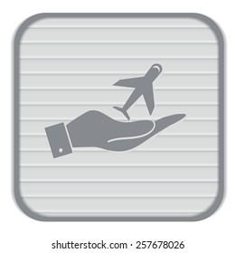 hand holding a airplane symbol . icon of air travel