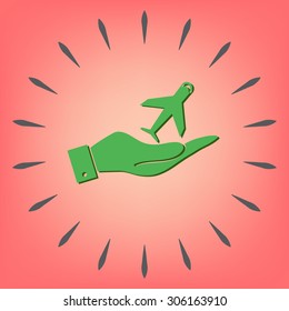 hand holding a airplane symbol . icon of air travel