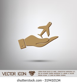 hand holding a airplane symbol . icon of air travel