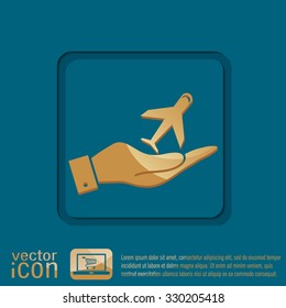 hand holding a airplane symbol . icon of air travel