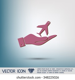 hand holding a airplane symbol . icon of air travel