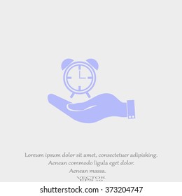 hand holding an alarm clock. Alarm icon . The clock shows the time