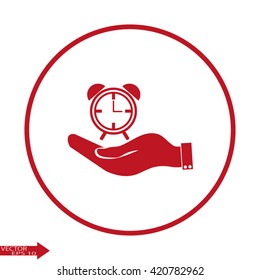 hand holding a alarm clock. Alarm icon . The clock shows the time