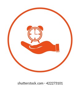 hand holding a alarm clock. Alarm icon . The clock shows the time