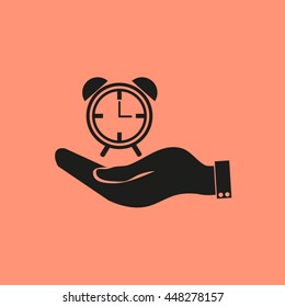 hand holding a alarm clock. Alarm icon . The clock shows the time