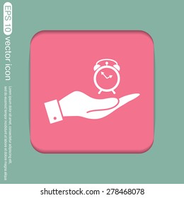 hand holding a alarm clock sign. Symbol morning. Alarm icon . The clock shows the time