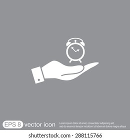 hand holding a alarm clock sign. Symbol morning. Alarm icon . The clock shows the time