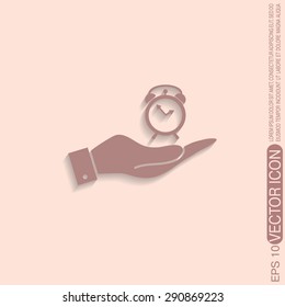 hand holding a alarm clock sign. Symbol morning. Alarm icon . The clock shows the time