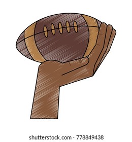 Hand holding American football ball
