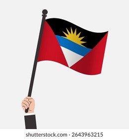 Mão segurando Antígua e Barbuda acenando bandeira