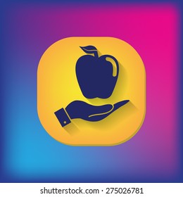 Hand holding apple