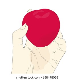 Hand holding an apple