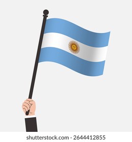 Mão segurando bandeira de ondulação Argentina