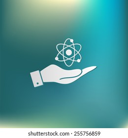 hand holding the atom, molecule. the symbol of physics and chemistry. symbol icon of physics or chemistry . the study of science