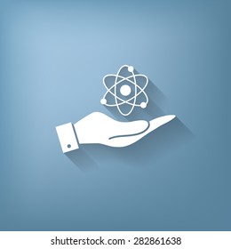 hand holding the atom, molecule. the symbol of physics and chemistry. symbol icon of physics or chemistry . the study of science