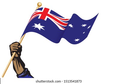 The hand holding the Australia flag.
