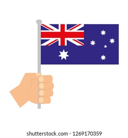 hand holding australia flag in stick