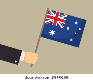 Mano con la bandera australiana. Ilustración vectorial.