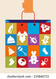 hand holding baby shopping bag with toy and cloth icons. illustration